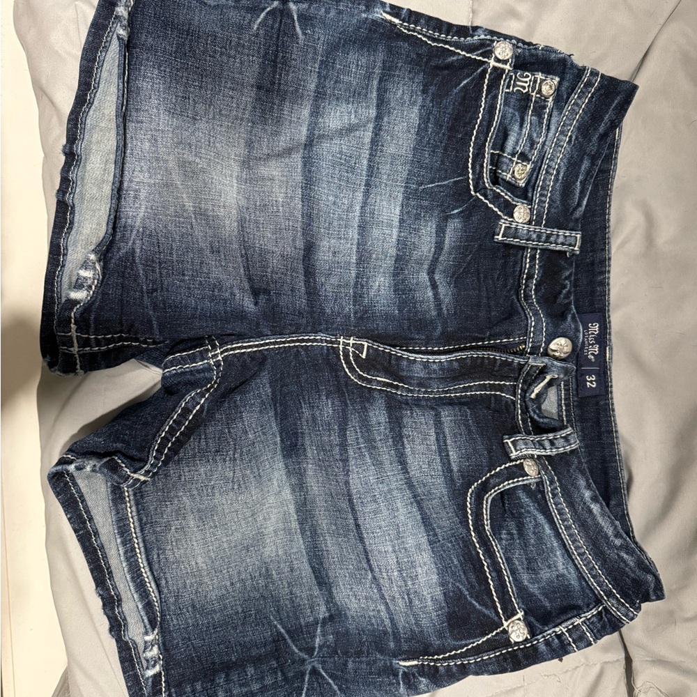 Miss Me American flag denim shorts.